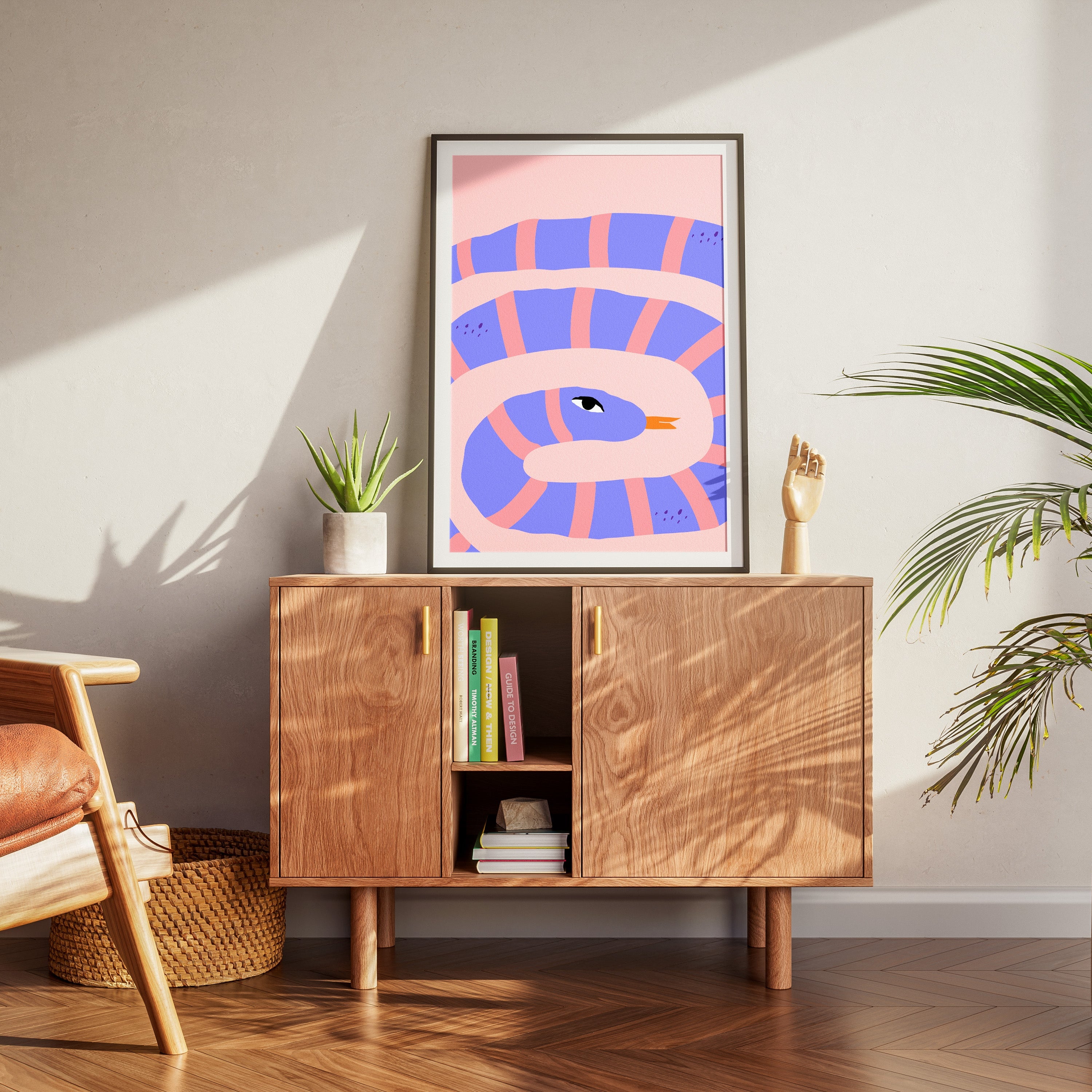 Modern living room with wooden cabinet, brown chair, and abstract art on the wall.